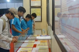 Exposition «Hoàng Sa, Truong Sa du Vietnam - les preuves historiques et juridiques» à Vinh Long