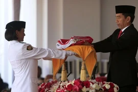 Indonésie : procession du drapeau original pour la Fête de l’Indépendance 