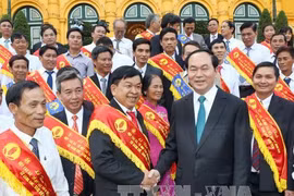 Le président Tran Dai Quang rencontre des agriculteurs exemplaires