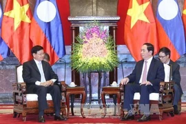 Le président Tran Dai Quang reçoit le PM laotien Thongloun Sisoulith