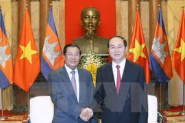 Le président Tran Dai Quang reçoit le PM cambodgien Samdech Techo Hun Sen