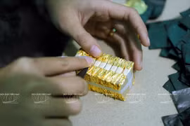 La fabrication de feuilles d’or du village de Kiêu Ky