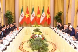 Entretien Tran Dai Quang – Hassan Rohani