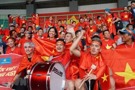 Football - ASIAD: La joie des supporters après la victoire du Vietnam contre la Syrie