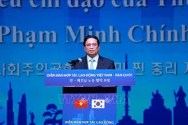 Le PM Pham Minh Chinh au Forum de coopération en matière de travail Vietnam-R. de Corée. Photo: VNA