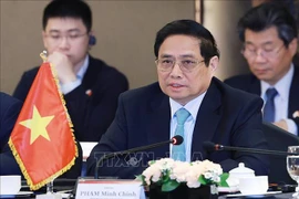 Le Premier ministre Pham Minh Chinh au petit-déjeuner-débat avec des dirigeants de grandes entreprises sud-coréennes. Photo : VNA