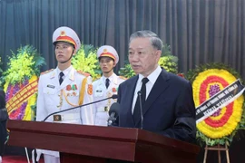 Le président To Lam prononce l'oraison funèbre en commémoration du secrétaire général Nguyen Phu Trong. Photo : VNA