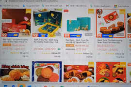 Le marché en demi-teinte des gâteaux de lune à Hanoï