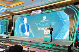 Le vice-ministre de l'Information et des Communications, Pham Duc Long au Sommet sur la sécurité du Vietnam 2024. Photo: VNA