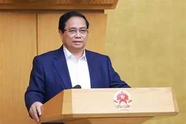 Le Premier ministre Pham Minh Chinh à la conférence gouvernementale sur le dressement du bilan de la mise en œuvre de la Résolution n° 18-NQ/TW. Photo: VNA