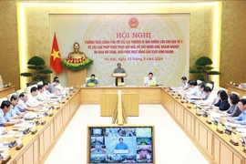 Le Premier ministre préside une conférence en ligne sur le traitement des conséquences du typhon Yagi. Photo : VNA