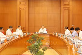 Lors del la réunion. Photo : VNA