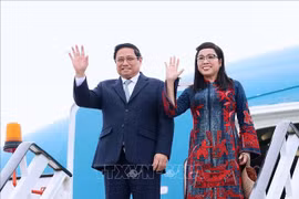 Le Premier ministre Pham Minh Chinh et son épouse. Photo : VNA