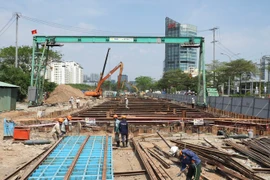 Sur le chantier de construction du projet de tunnel d'intersection Nguyen Van Linh-Nguyen Huu Tho (Photo : journal Sai Gon Giai Phong)
