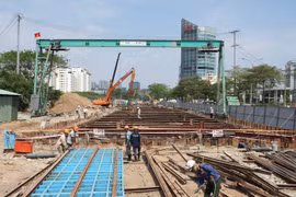 Sur le chantier de construction du projet de tunnel d'intersection Nguyen Van Linh-Nguyen Huu Tho (Photo : journal Sai Gon Giai Phong)
