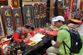 Marché de la calligraphie du Têt à Ho Chi Minh-Ville