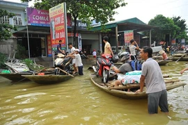 Débat sur les impacts des inondations du Vietnam à Paris