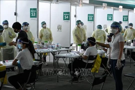 COVID-19 : Singapour enregistre plus de 10.000 cas par jour pour la première fois