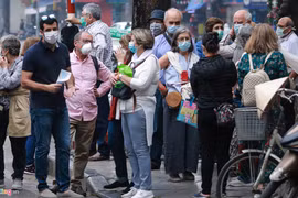 COVID-19: Les visiteurs étrangers confiants en les mesures prises par Hanoi