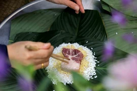 La confection de banh chung- une culture traditionnelle du peuple vietnamien à l’occasion du Tet