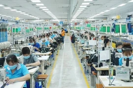 Des ouvriers retournent aux ZI et ZF à Binh Phuoc et Dong Nai après le COVID-19