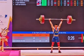 SEA Games 31: l'haltérophile Lai Gia Thanh bat son record pour remporter une médaille d'or 