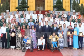 Le président Tran Dai Quang rencontre des victimes de l’agent orange/dioxine