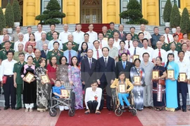 Le président Tran Dai Quang rencontre des victimes de l’agent orange/dioxine