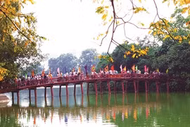 Hanoï se pare de son manteau automnal