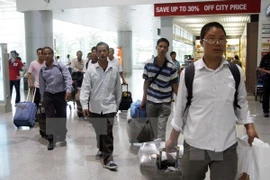 Renforcement de la protection des droits des travailleurs vietnamiens à l’étranger