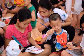 Haut les masques à la Fête de la Mi-automne