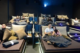 Cinéma au lit : un nouveau loisir au Vietnam