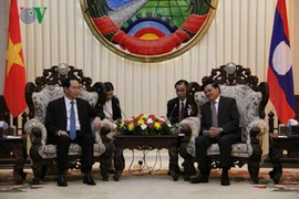 Le président Trân Dai Quang rencontre le PM et la présidente de l'AN du Laos