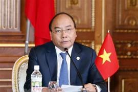 Le PM Nguyên Xuân Phuc à la conférence de presse conjointe sur le 10ème sommet Mékong-Japon