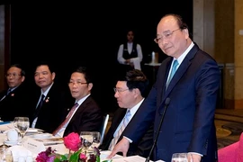 Le PM Nguyen Xuan Phuc rencontre des investisseurs australiens et vietnamiens 