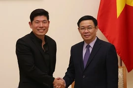 Le vice-PM Vuong Dinh Huê reçoit le directeur exécutif de Grab Anthony Tan