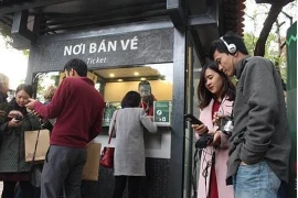 Mise en fonction du système d’explication automatique en 8 langues au Temple de la littérature