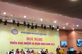 Le Premier ministre Nguyên Xuân Phuc à une conférence de la banque d’Etat 