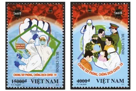 COVID-19 : des peintres vietnamiens et leurs affiches sur un journal britannique ​