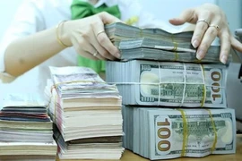 Prévisions sur les effets au marché financier du Vietnam après la décision de la Fed