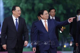 Rencontre des Premiers ministres du Vietnam et du Laos