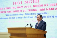 Le Premier ministre Pham Minh Chinh s'exprime lors de la conférence. Photo: VNA