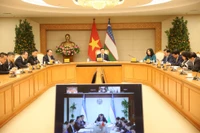 La réunion en ligne entre le vice-Premier ministre Tran Hong Ha et son homologue ouzbek, Jamshid Khodjaev, le 9 février. Photo: baochinhphu.vn