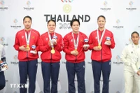 Les athlètes Nguyen Thi Phuong, Nguyen Ngoc Tram, Bui Ngoc Nhi et Hoang Thi Thu Uyen ont remporté la médaille d'or dans l'épreuve de Kata par équipe féminine. (Photo : VNA)