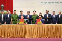 Vue de la cérémonie de signature du protocole d’accord entre le ministère de l’Agriculture et de l’Environnement et le ministère de la Sécurité publique. Photo : VNA
