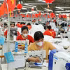 Ligne de production de vêtements destinés à l'exportation à Bac Ninh. Photo : VNA