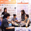 Des entreprises recherchent des opportunités de collaboration lors de ce salon. Photo: VNA