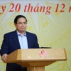 Le Premier ministre Pham Minh Chinh, chef Comité national de pilotage chargé de la mise en œuvre de la Résolution n°68-NQ/TW du Bureau politique sur le développement de l’économie privée s'exprime lors de la réunion. Photo : VNA