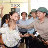 Le vice-Premier ministre Ho Quoc Dung a rendu visite aux sinistrés et de superviser les opérations de secours et de reconstruction après les pluies torrentielles et les crues dans la commune de Muong Than, province de Lai Chau (Nord), Photo : VNA