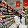 Des produits vietnamiens vendus au supermarché français. Photo: VNA